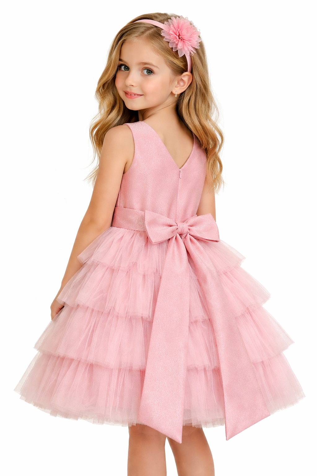 Back view of the high-quality pink flower girl dress highlighting the large satin bow and premium tiered tulle layers.