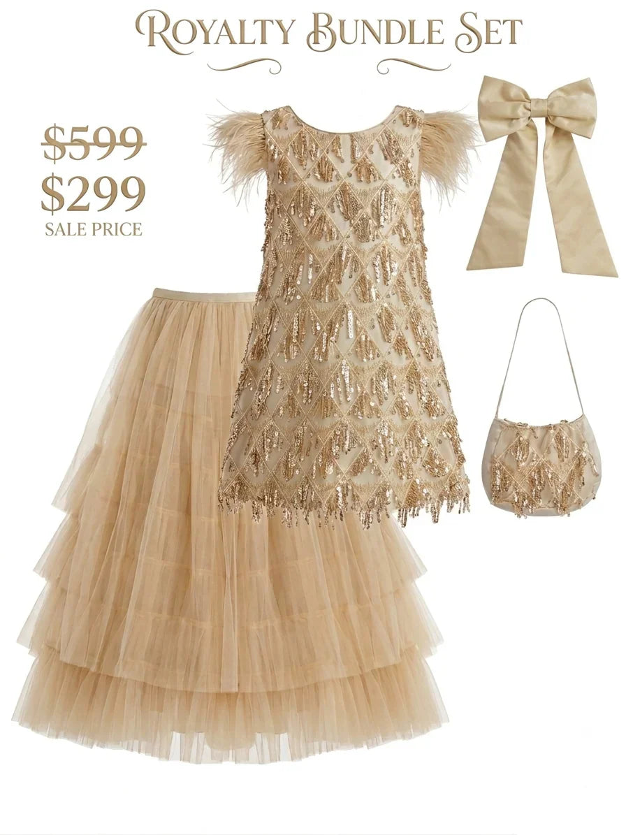 Complete 4-piece girls gold royalty bundle set flat lay including sequin dress, detachable tulle layered skirt, matching handbag, and detachable dress bow.