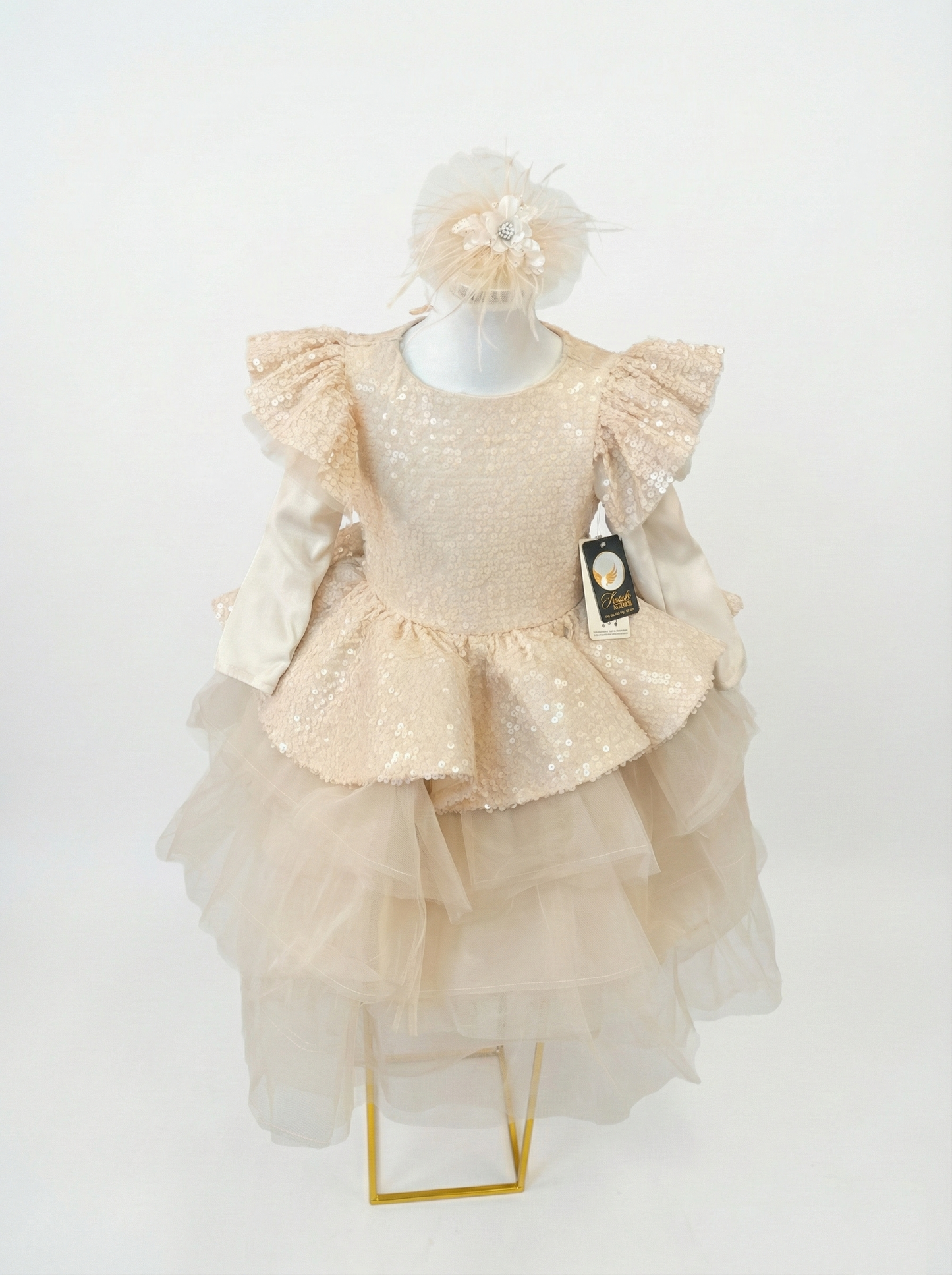 Shimmering Blush Sequin Peplum Gown with Feather Headband Set