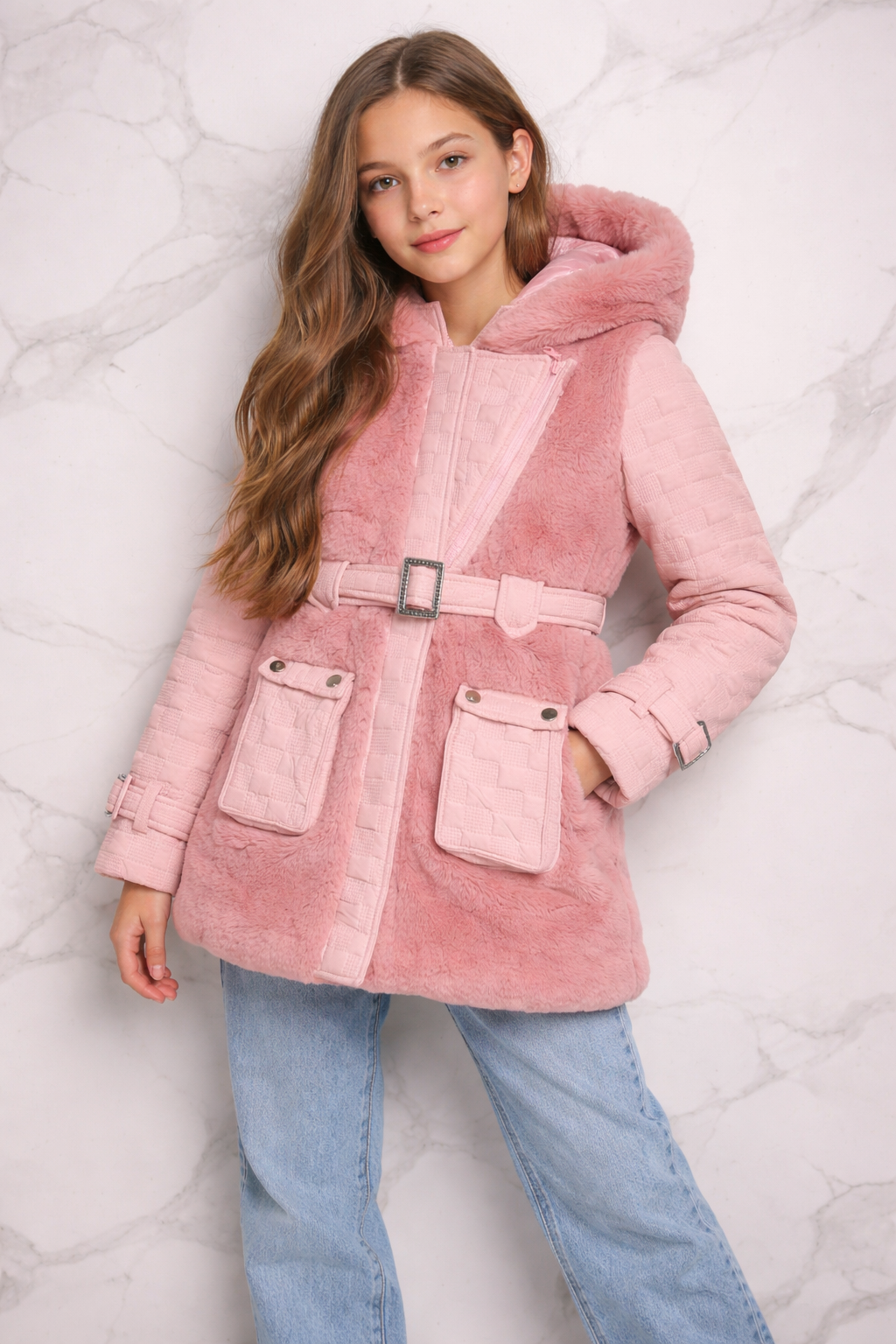 Young girl model wearing the Isabella luxury rose pink faux fur hooded coat from the front, showing the plush texture and polished silver rectangular buckle belt.