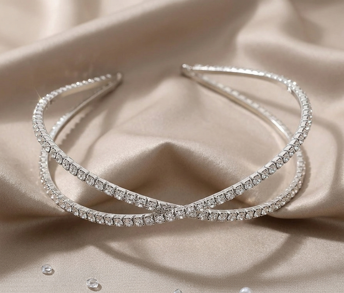 Elegant childrens formal hair accessories showing a silver rhinestone criss cross headband in Melbourne