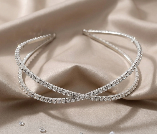 Elegant childrens formal hair accessories showing a silver rhinestone criss cross headband in Melbourne