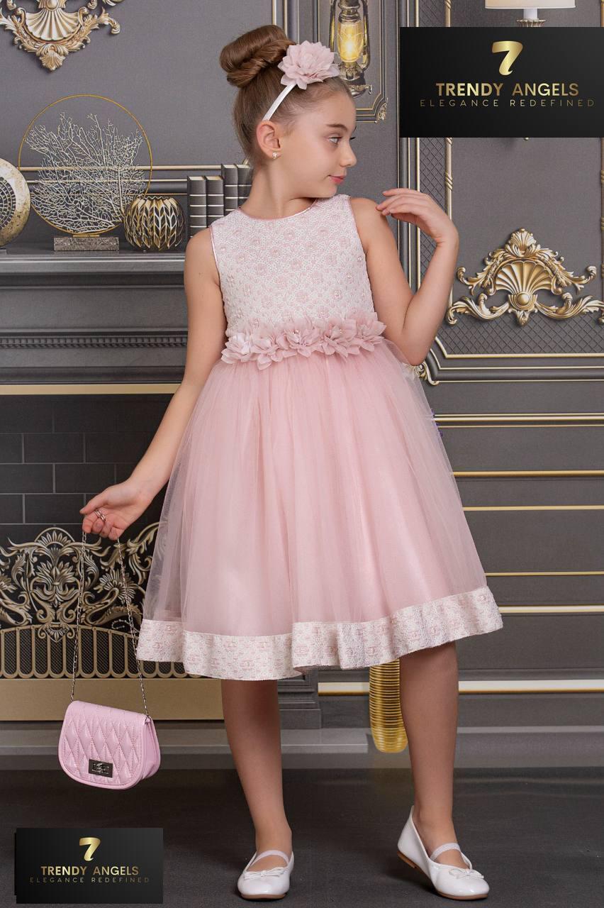 Full length view of Seraphina Pink Girls Occasion Dress featuring intricate lace bodice, floral waist detail, and quilted pink purse.