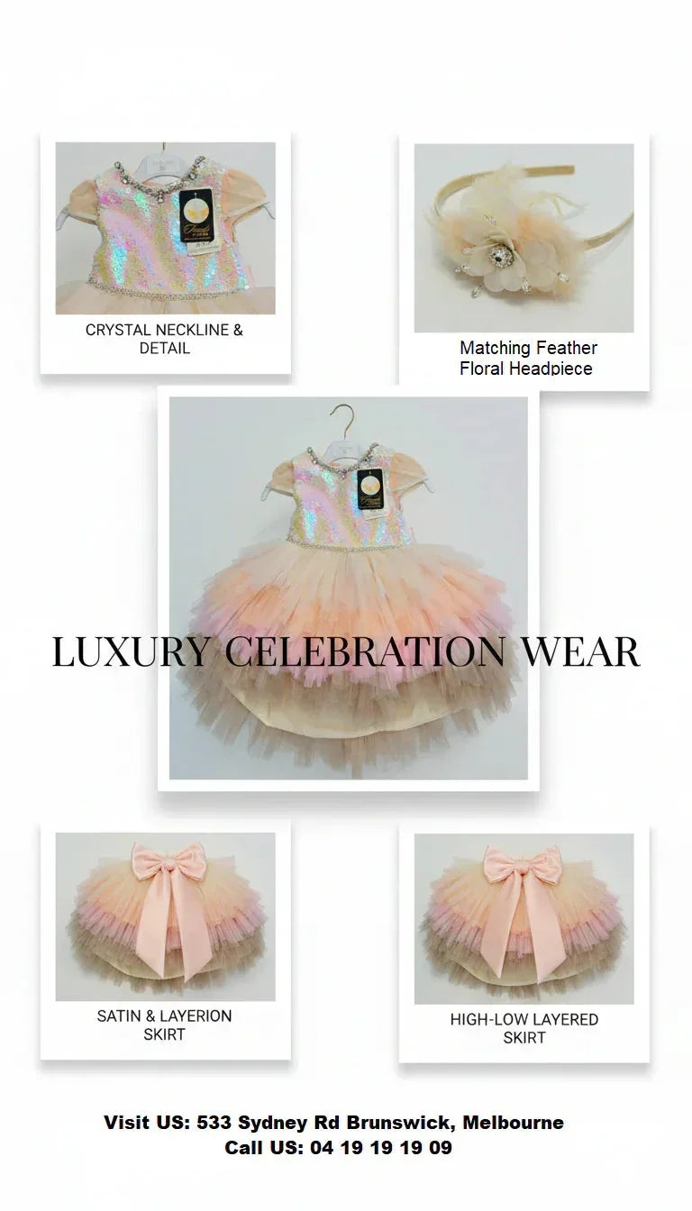 Luxury handmade children's celebration dress with long floral wing sleeves, iridescent sequin bodice, crystal-embellished neckline and waist belt, and multi-colored ombré tulle skirt. Available at our boutique: 533 Sydney Rd, Brunswick, Melbourne.