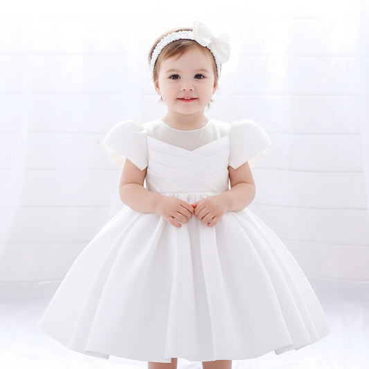 White satin flower girl dress with caped sleeves and back bow tie - Luxury holy communion and baptism gown for girls at Trendy Angels Boutique Melbourne.