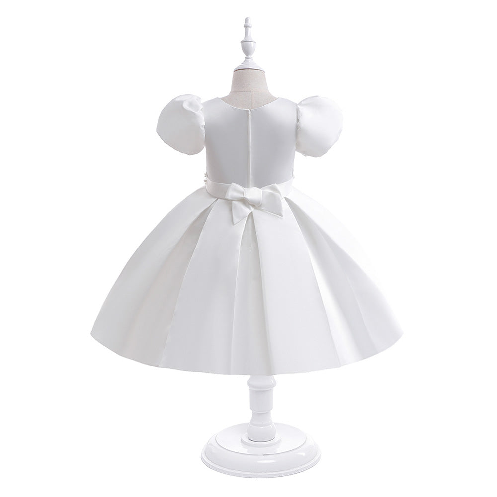 Back view of a white formal princess dress for girls featuring a smooth satin bodice, elegant floor-length skirt, and secure zipper closure