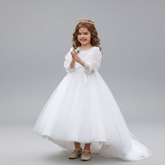 Young girl wearing a white V-neck princess dress with bubble sleeves, pearl-beaded waist, and tiara, perfect for formal occasions in Brunswick.